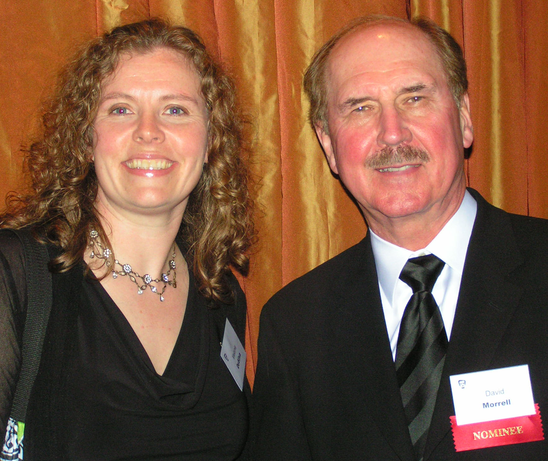 Bruce DeSilva’s Daughter Melanie with Nominee David Morrell/ courtesy of author