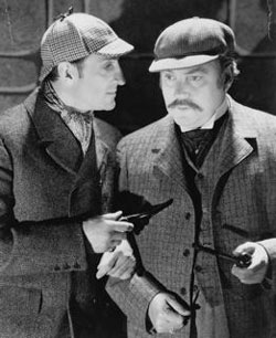 Basil Rathbone as Sherlock Holmes with Nigel Bruce as Dr. Watson