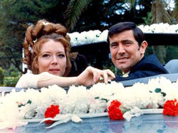 Diana Rigg and George Lazenby as Mr. and Mrs. James Bond