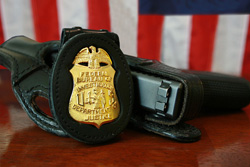 FBI agent’s badge and gun Romantic Suspense’s top cops