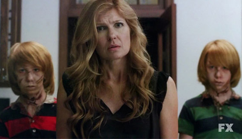 Connie Britton as Viv with dead kids in American Horror Story