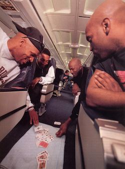 Card-playing champion Chicago Bulls on the team plane, including NBA Hall of Fame gazillionaires Scottie Pippen and Michael Jordan