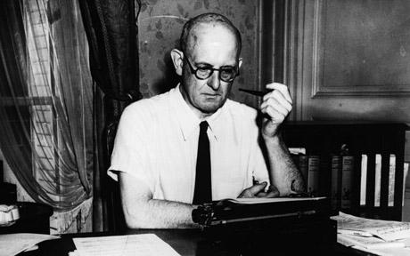 P. G. Wodehouse at his typewriter with pipe