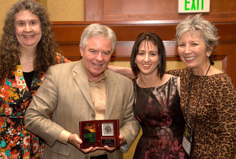 Darrell James, winner of the Eureka! award, flanked by the three other finalists (from left to right), Sally Carpenter, Tammy Kaehler and Rochelle Staab.