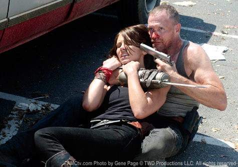 Merle with gun to Maggie’s head