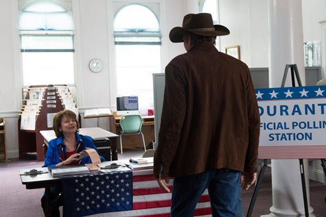 Walt Longmire arrives to vote for himself for sheriff.
