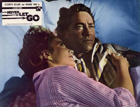 Elizabeth Sellars and Richard Todd as the ordinary Mr. and Mrs.Cummings in Never Let Go (1960)