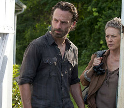 Rick and Carol on a supply run in Season 4, Episode 4 of The Walking Dead