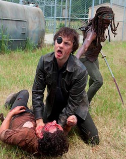 Michonne stabs the Governor to save Rick in The Walking Dead 4.08 "Too Far Gone"/ Photo: Gene Page for AMC