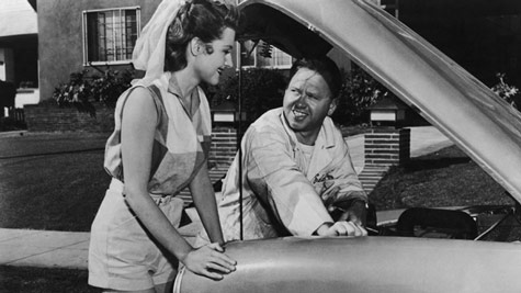 MickeDriver and mechanic Eddie Shannon (Mickey Rooney) with Barbara Mathews (Dianne Foster), a gangster's girlfriend in the 1954 noir film Drive a Crooked Road.