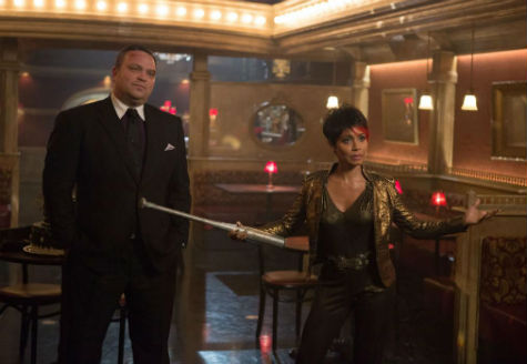 Fish Mooney (Jada Pinkett Smith, R) and Butch Gilzean (Drew Powell, L) pay Oswald Cobblepot a visit in the "Welcome Back, Jim Gordon" episode of Gotham.