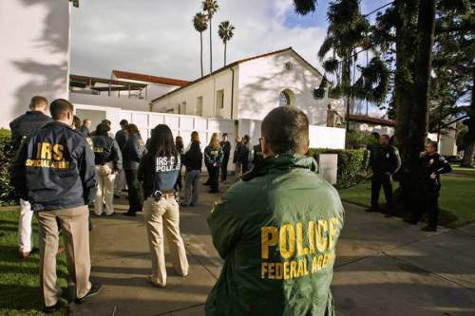 Federal agents outside the Bowers Museum in Santa Ana, CA
